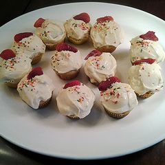 A picture of Honey/Lemon/Ricotta Cupcakes with Lemon Cream Cheese Frosting.