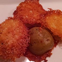 A picture of Parmesan Laced Baked Potatoes.