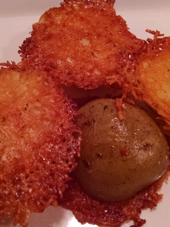 A picture of Parmesan Laced Baked Potatoes.