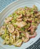 Salteado de arroz de brócoli con pota al ajillo
