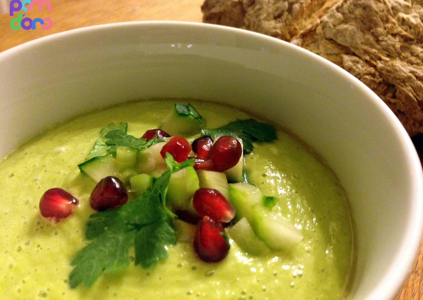 Cold avocado soup with cucumber and pomegranate sauce