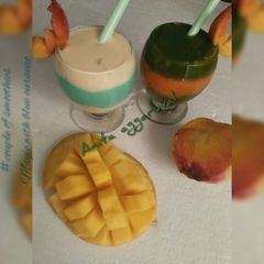 A picture of A couple of smoothies#magic with blue curacao syrup.