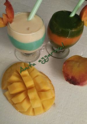 A picture of A couple of smoothies#magic with blue curacao syrup.