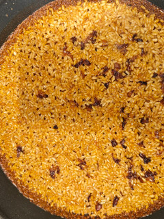 Una foto de Arroz con caldo de manitas