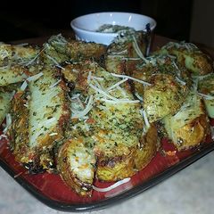 A picture of Mike's Garlic Parmesan Steak Fries & Aioli.