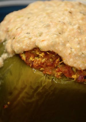 A picture of Cauliflower Stuffed Peppers w/Spicy Queso Marinara.