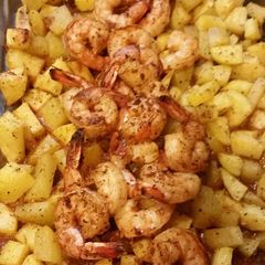 A picture of Steak house shrimp and potatoes.