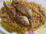 أرز بالسمك والقرنيط (الأخطبوط)