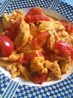 A picture of Standard Chinese-style Stir-fried Egg and Tomatoes.