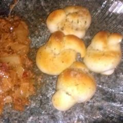 A picture of Parmesan garlic knots.