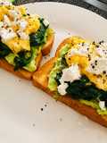 Avo toast with spinach, scrambled eggs and feta