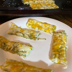Cheesy zucchini sticks A picture of Cheesy zucchini sticks.