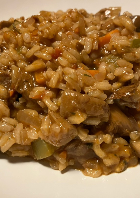 Una foto de Arroz meloso con ternera y setas