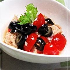 A picture of Marinated Olives and Tomatoes.