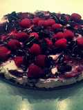 Oreo Cheesecake With Raspberries & Blueberry Syrup