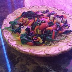 A picture of Shrimp mixed garden pasta with balsamic glaze.