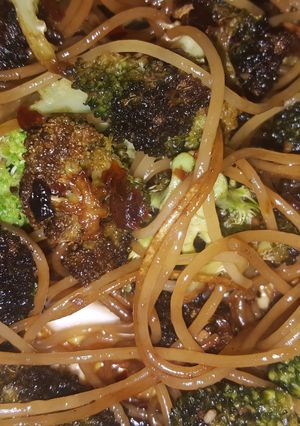 A picture of Broccoli and angel hair pasta toss.