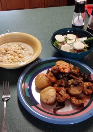 A picture of Shrimp and Sea Scallops with Oyster Mushrooms.