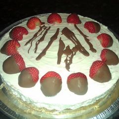 A picture of Non-bake Chocolate Dipped Strawberry Cheesecake.