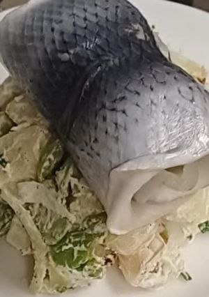 Une photo de Salade de pommes de terre aux hareng fume