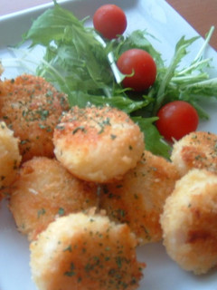 A picture of Scallops with Cheesy Panko.