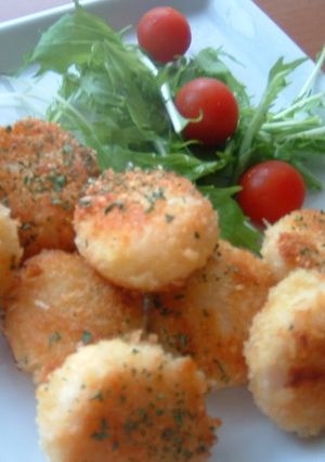 A picture of Scallops with Cheesy Panko.