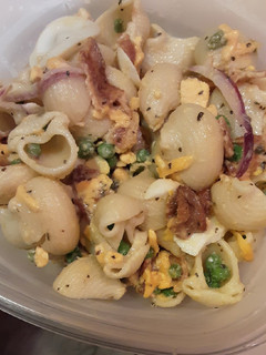 A picture of Bacon Pea Creamy Pasta Salad with lemon parmesan dressing.