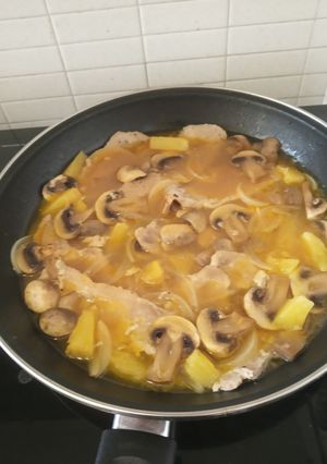 Una foto de Lomo de cerdo en gravy de durazno