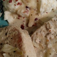 A picture of Alfredo porkchops.