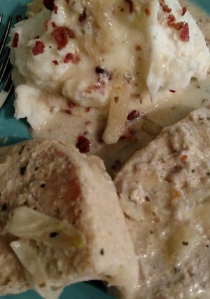 A picture of Alfredo porkchops.