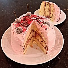 A picture of Vanilla Chip Layer Cake with Cherry Curd Filling.