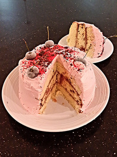 A picture of Vanilla Chip Layer Cake with Cherry Curd Filling.