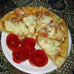 A picture of Chicken fajita pizza.
