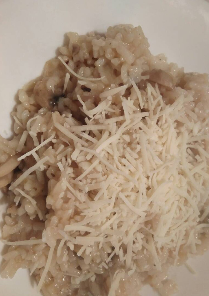 Una foto de Risotto con champiñones y cebolla pochada