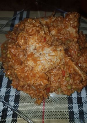 Una foto de Arroz con pollo 🍗🍗