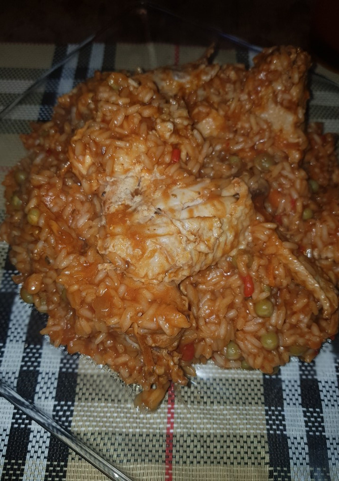 Una foto de Arroz con pollo 🍗🍗