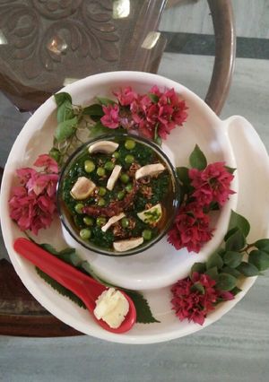 A picture of Sarson ka sag with green pease & mushroom.