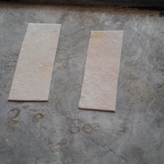 A picture of Wonton wrappers from scratch.