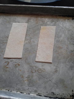 A picture of Wonton wrappers from scratch.