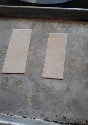 A picture of Wonton wrappers from scratch.