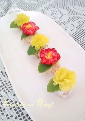 A picture of Radish Dandelion Sushi Balls For Doll Festival or Mother's Day.