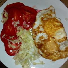 A picture of Fried egg with salad#localfoodcontest-mombasa.