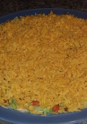 A picture of The BEST taco dip ever.