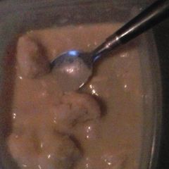A picture of Homemade chicken n dumplings with cresents.