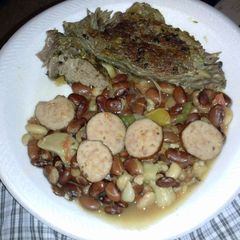A picture of Chuck roast and pantry beans with hamhock and sausage.