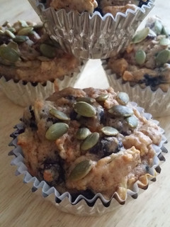 A picture of Carrot zucchini blueberry muffins.
