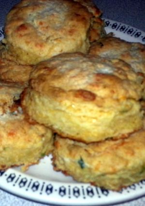 A picture of Cornmeal cheddar cheese garlic chive biscuits.