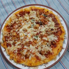 A picture of Chicken Tikka Pizza 🍕🍕.