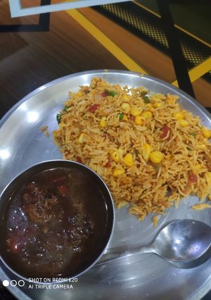 A picture of Fried rice and Manchurian.
