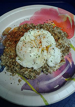 A picture of Cheesy sausage with poached eggs.